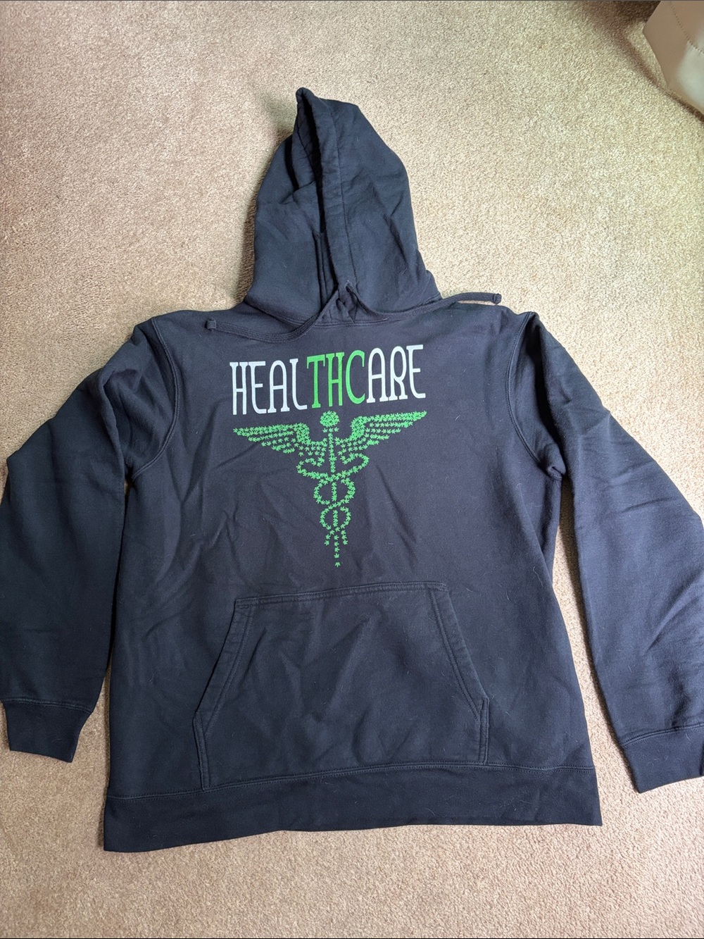 HealTHCare Logo Black Hooded Sweatshirt with Green Graphic